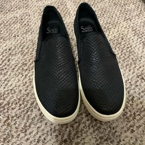 Black snakeskin sneakers